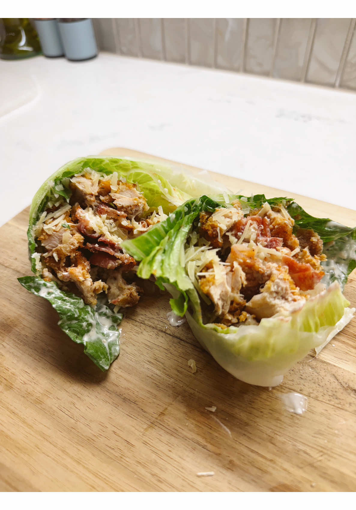 Making crisp caesar lettuce wraps with chicken, bacon, and parmesan, low carb and light