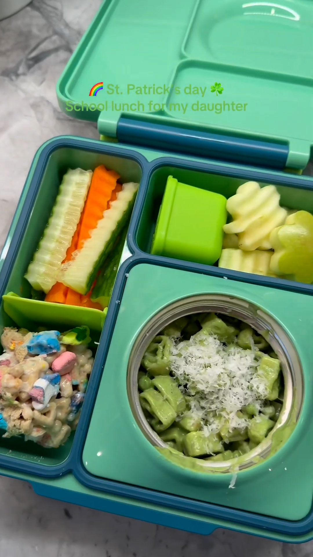 Shamrock inspired school lunch with green treats and shapes perfect for school days