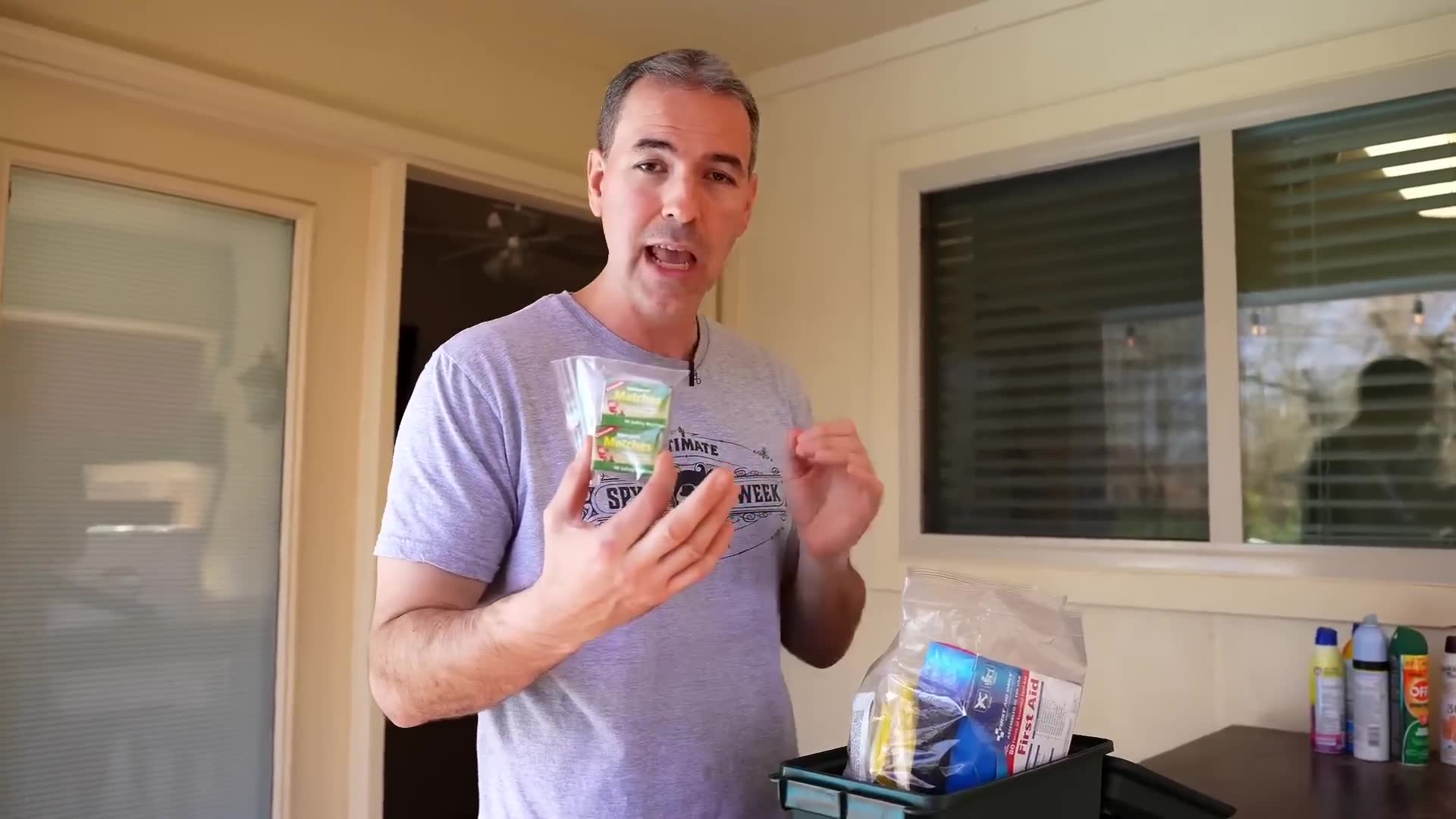 Inside a metal ammo can packed with emergency survival gear