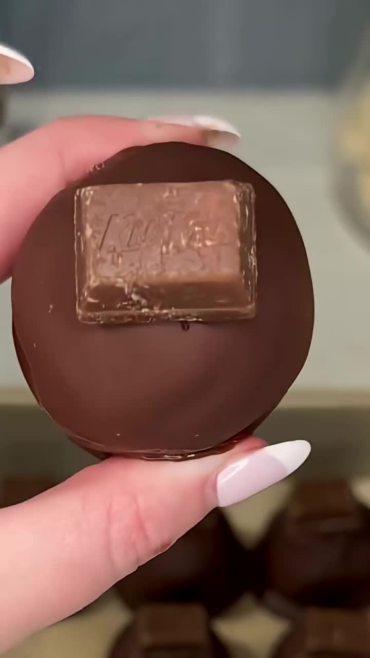 Sugar cookie cake balls get crispy wafer bits and a chocolate shell