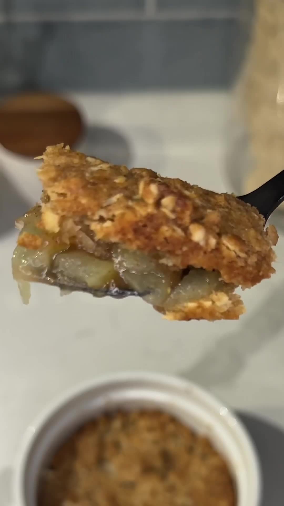 Mini apple crumble bakes soft cinnamon fruit under a crisp top