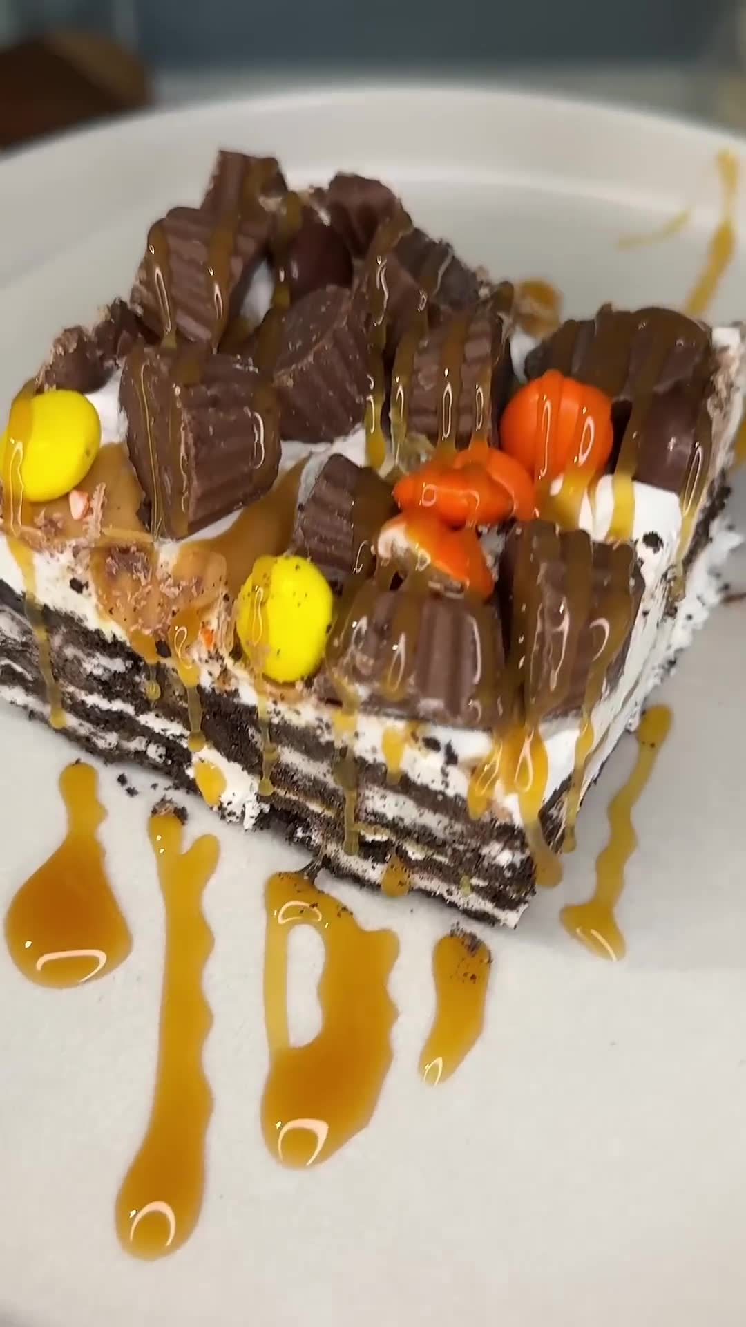 Layered icebox cake softens Oreos into a sliceable peanut butter dessert