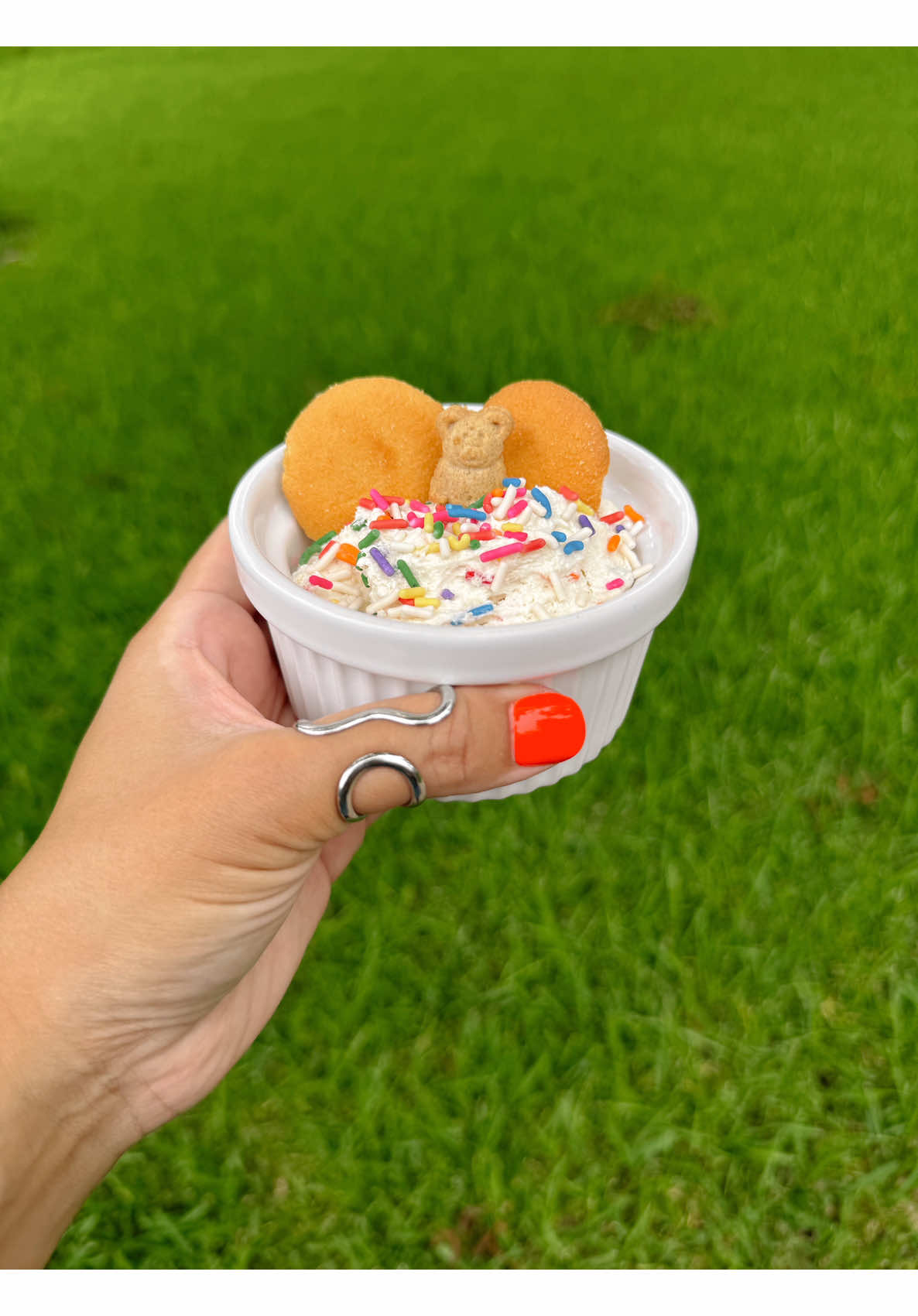 Trying a cute pudding cup topped with Nilla wafers, sprinkles, and a teddy bear cookie