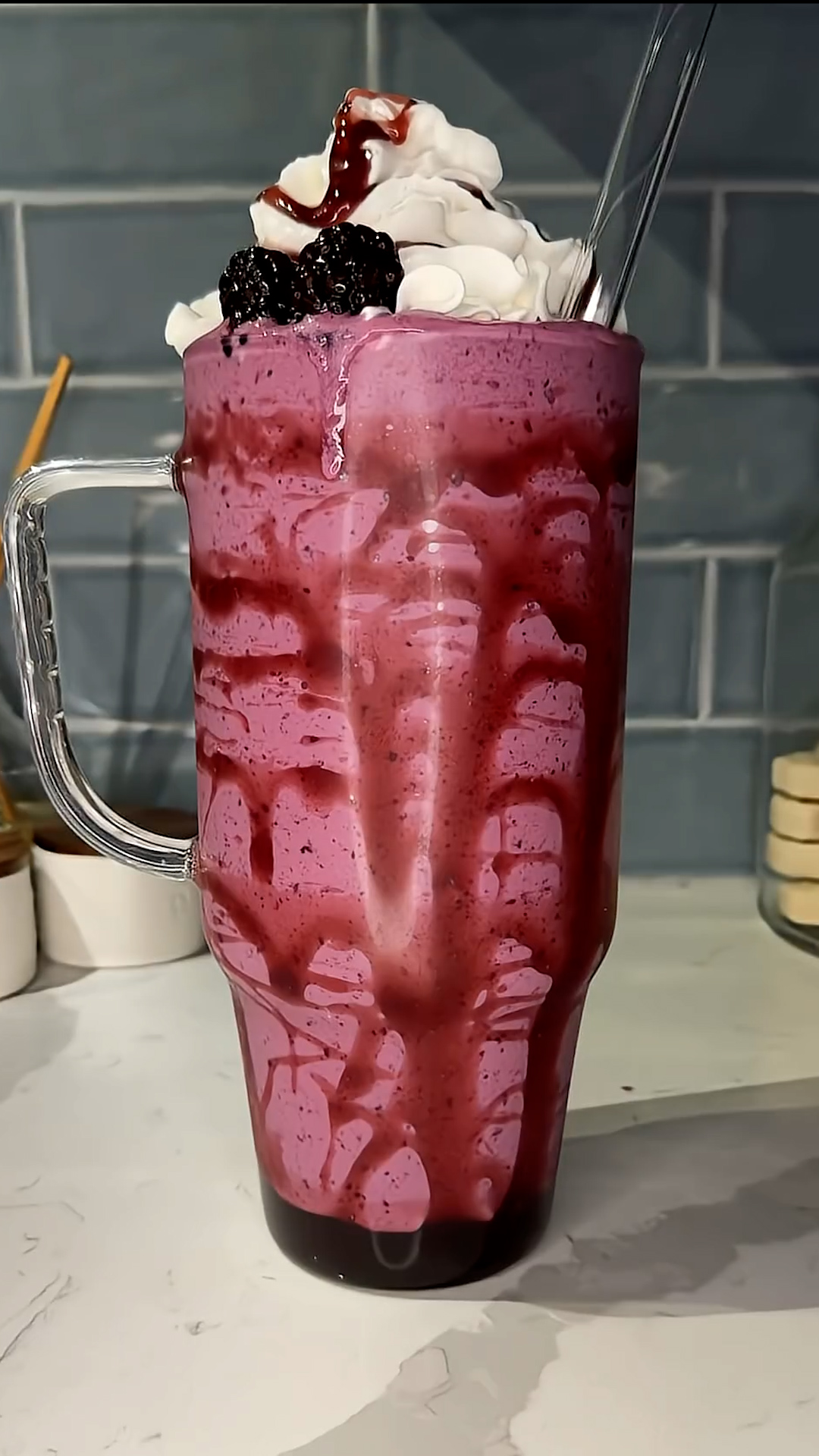 Creamy blended milkshake gets its color from ripe blackberries