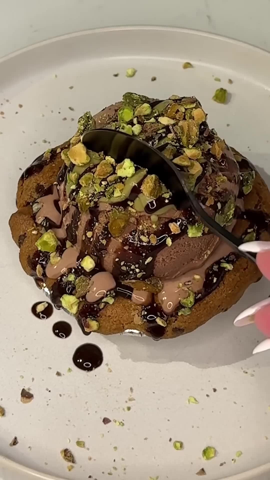 Single skillet cookie hides a green pistachio Dubai chocolate center