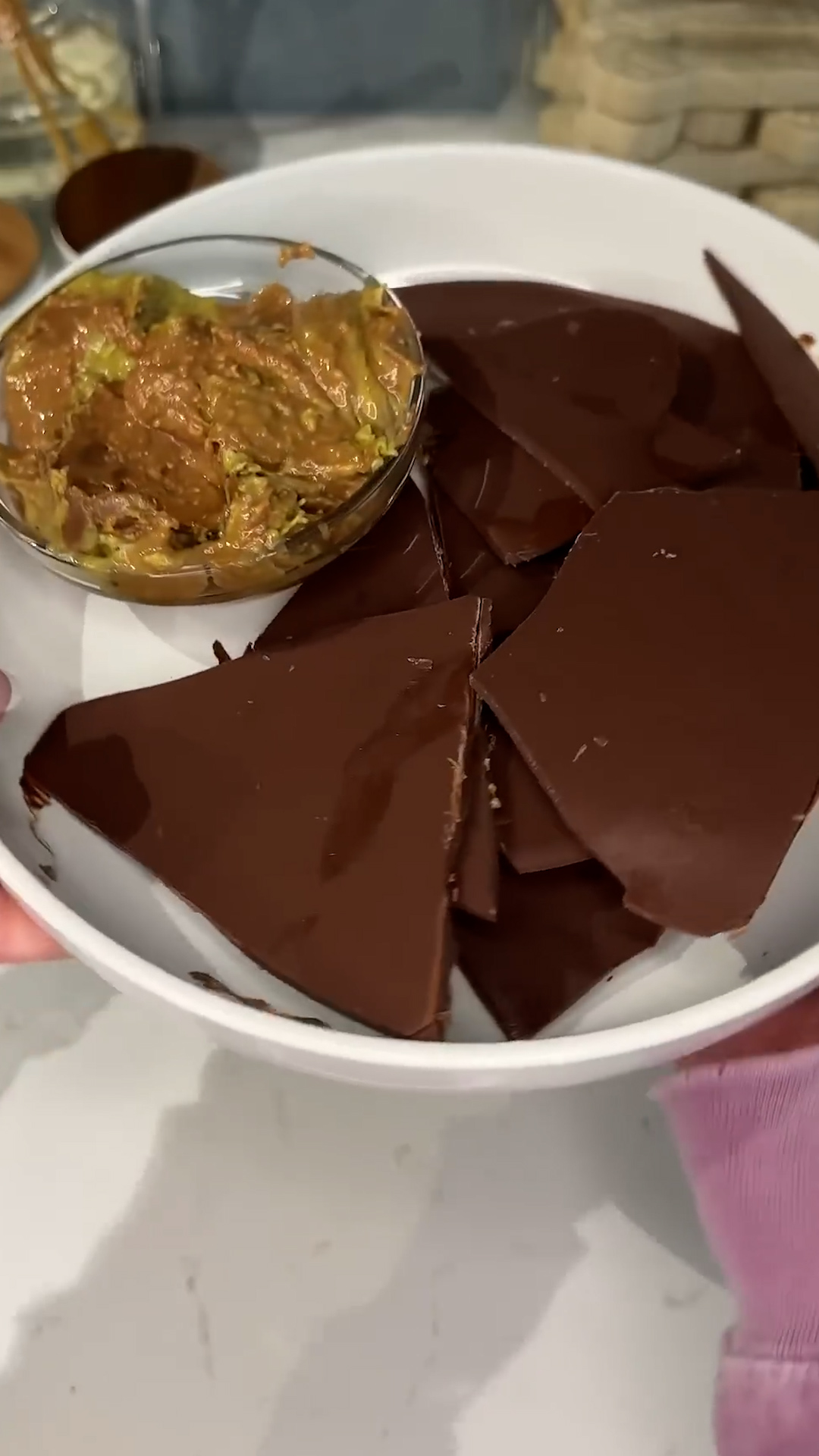 Chocolate chips and pistachio cream served as a sweet Dubai-style dip