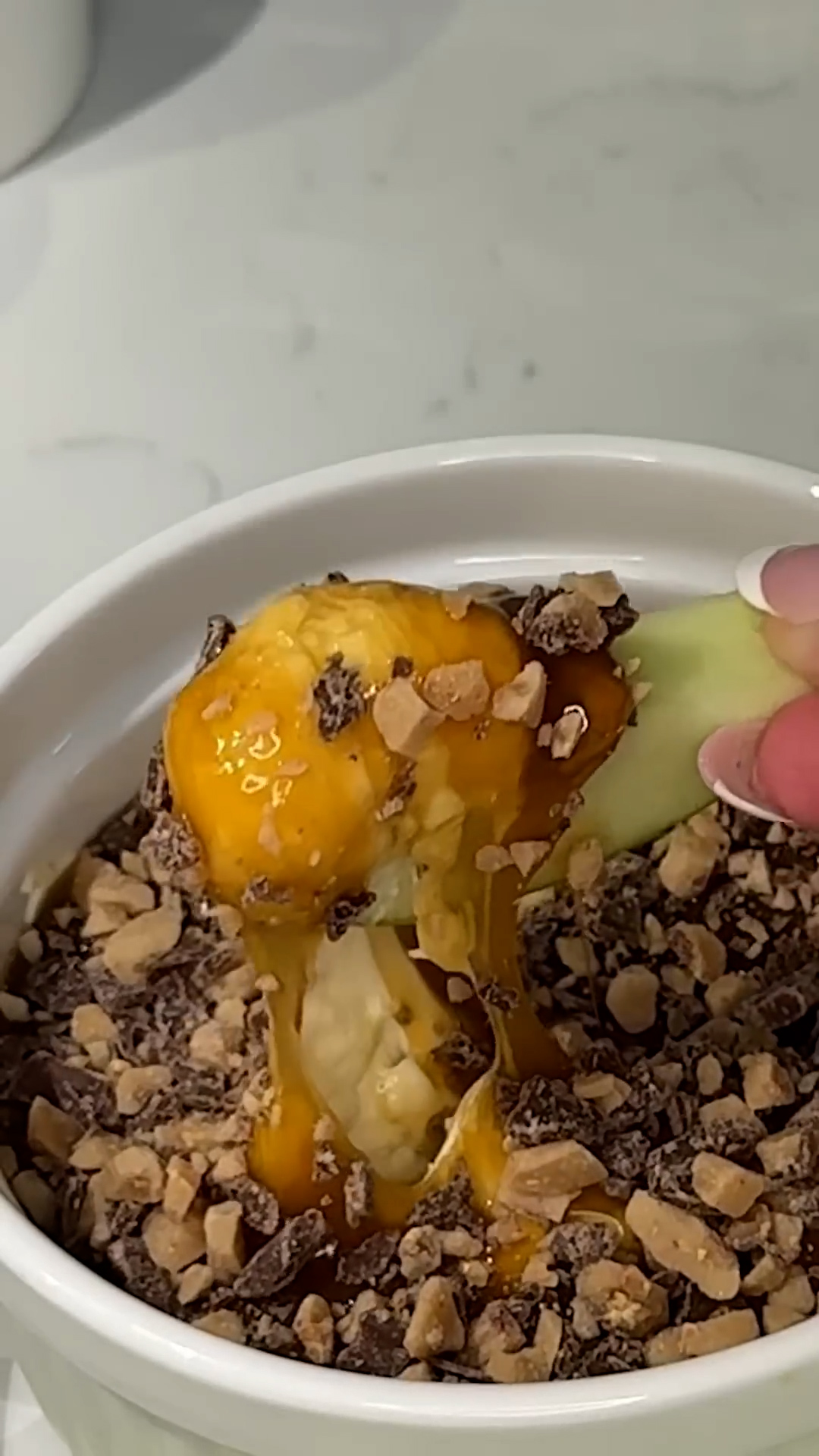 Caramel and cheesecake blended into a dip served with apples