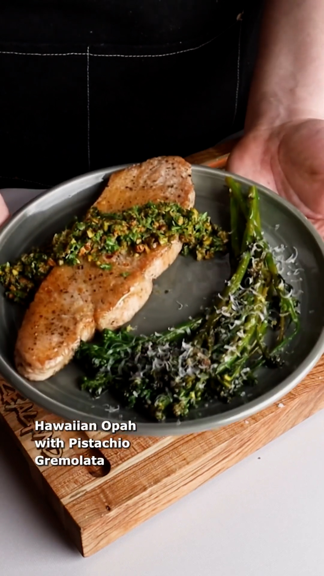 Butter-basted opah pistachio topping
