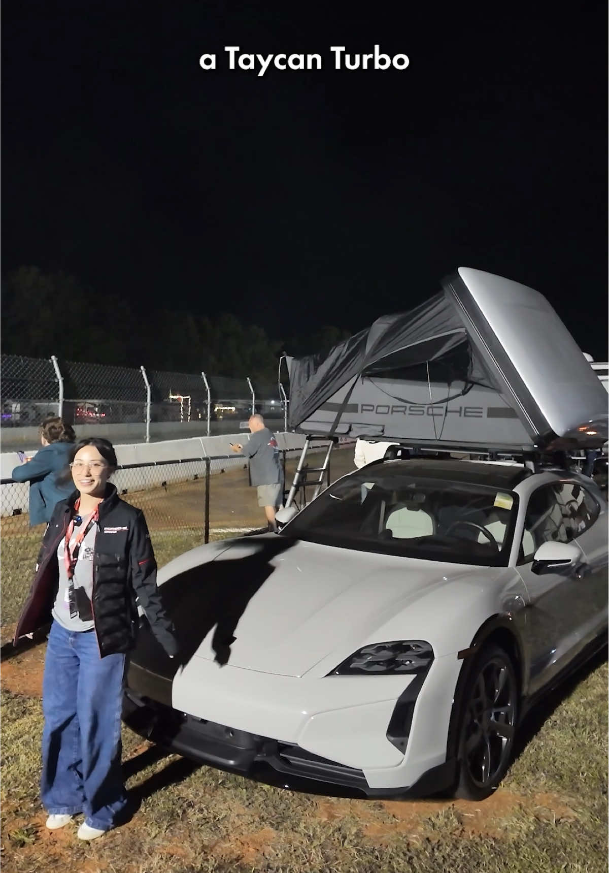 Camping off a Porsche Taycan with a rooftop tent and a championship to celebrate