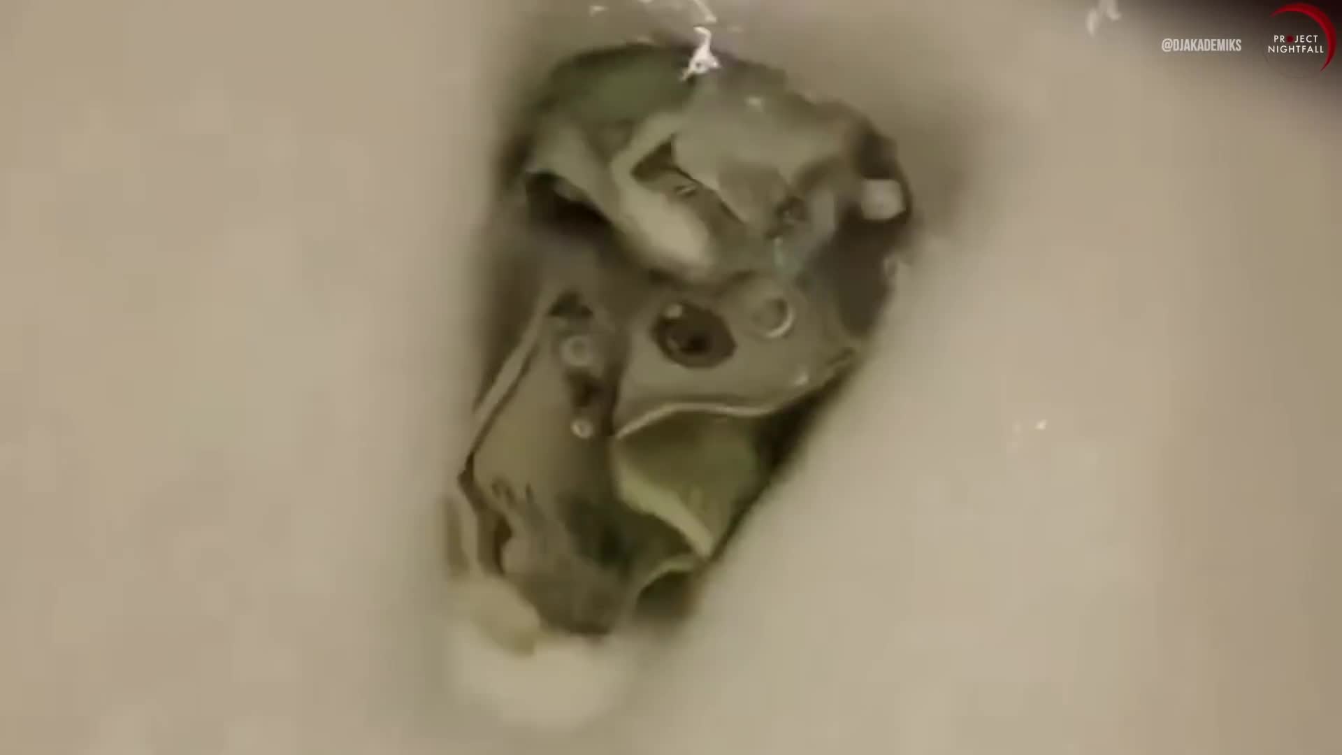 Why is this man throwing $100,000 into the ocean and down the toilet