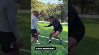 Cowboys Donovan Ezeiruaku working with Lance Deane on his pass rush moves.