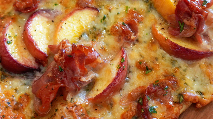 How to Make Flatbread with Peach, Prosciutto, Gorgonzola, and Hot Honey