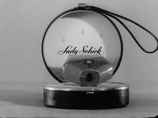 Lady Schick Electric Shaver "So Smooth No One Would Ever Guess She Shaved" Christmas Commercial